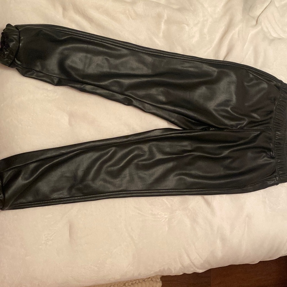 Woman’s Xs leather joggers.